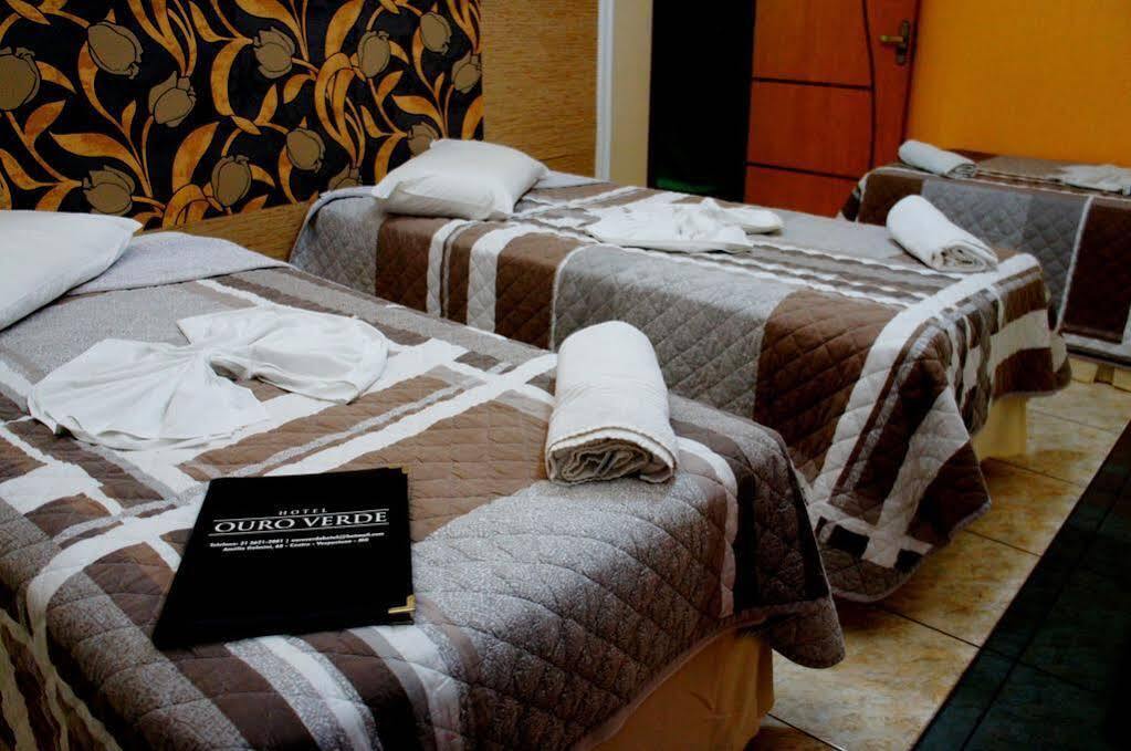 Ouro Hotel Vespasiano Bagian luar foto